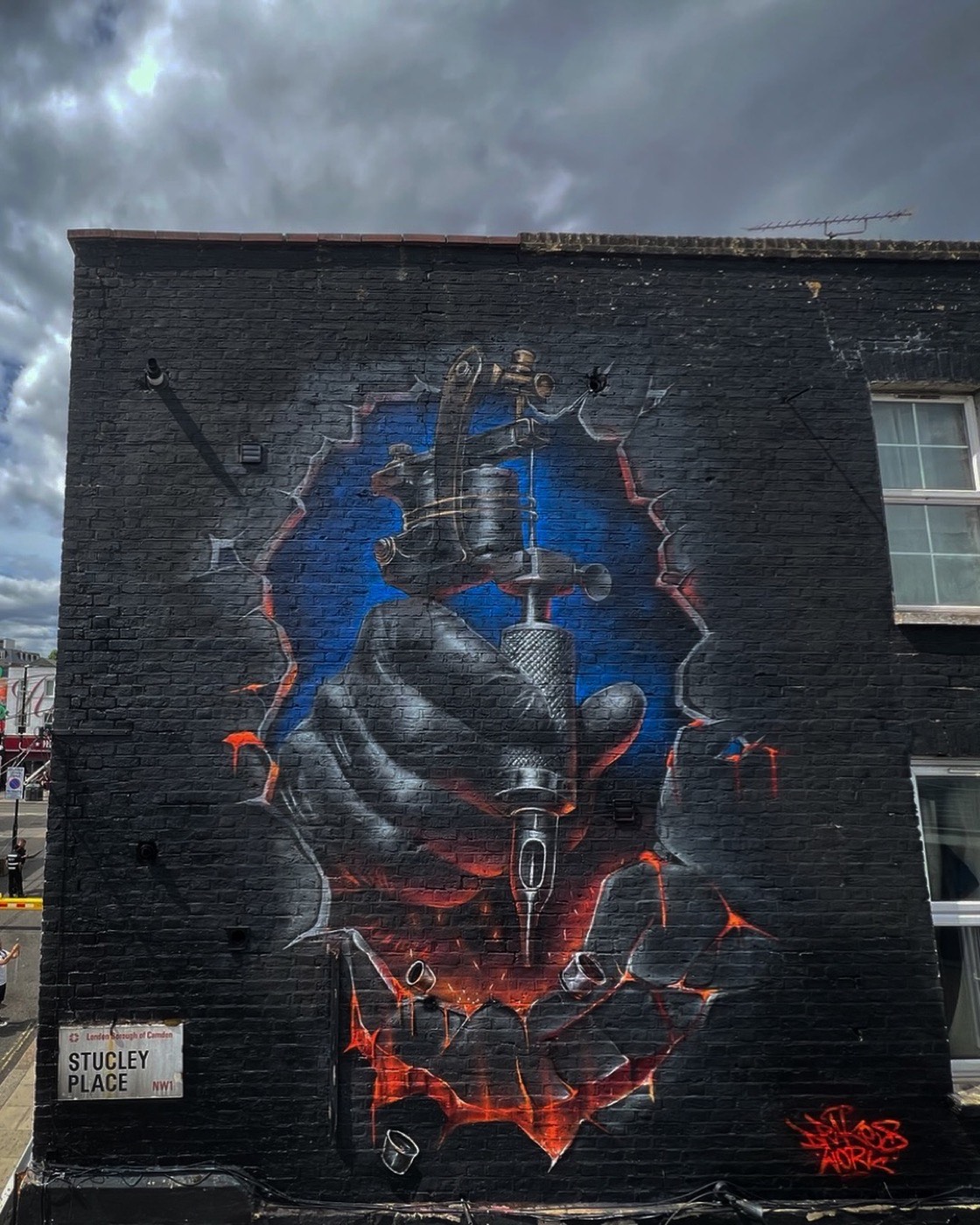 3D-effect tattoo gun mural in Stucley Place, NW1, London by Top Murals