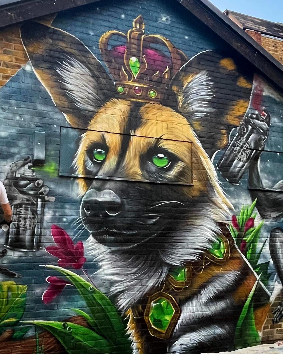 African wild dog with crown mural by Top Murals